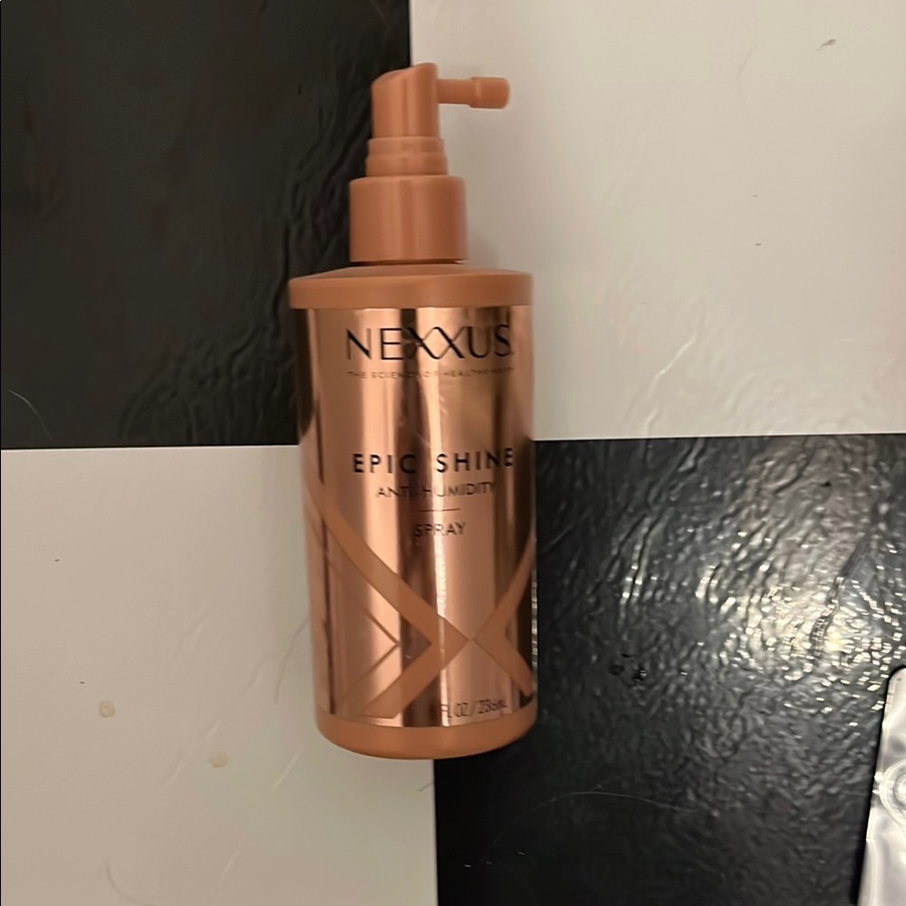 USED ONCE Nexx Epic Shine Anti-Humidity Spray - Bronze bottle